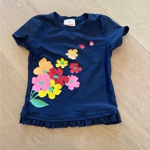 Hanna Andersson short sleeve rash guard - navy with flowers girls swim top